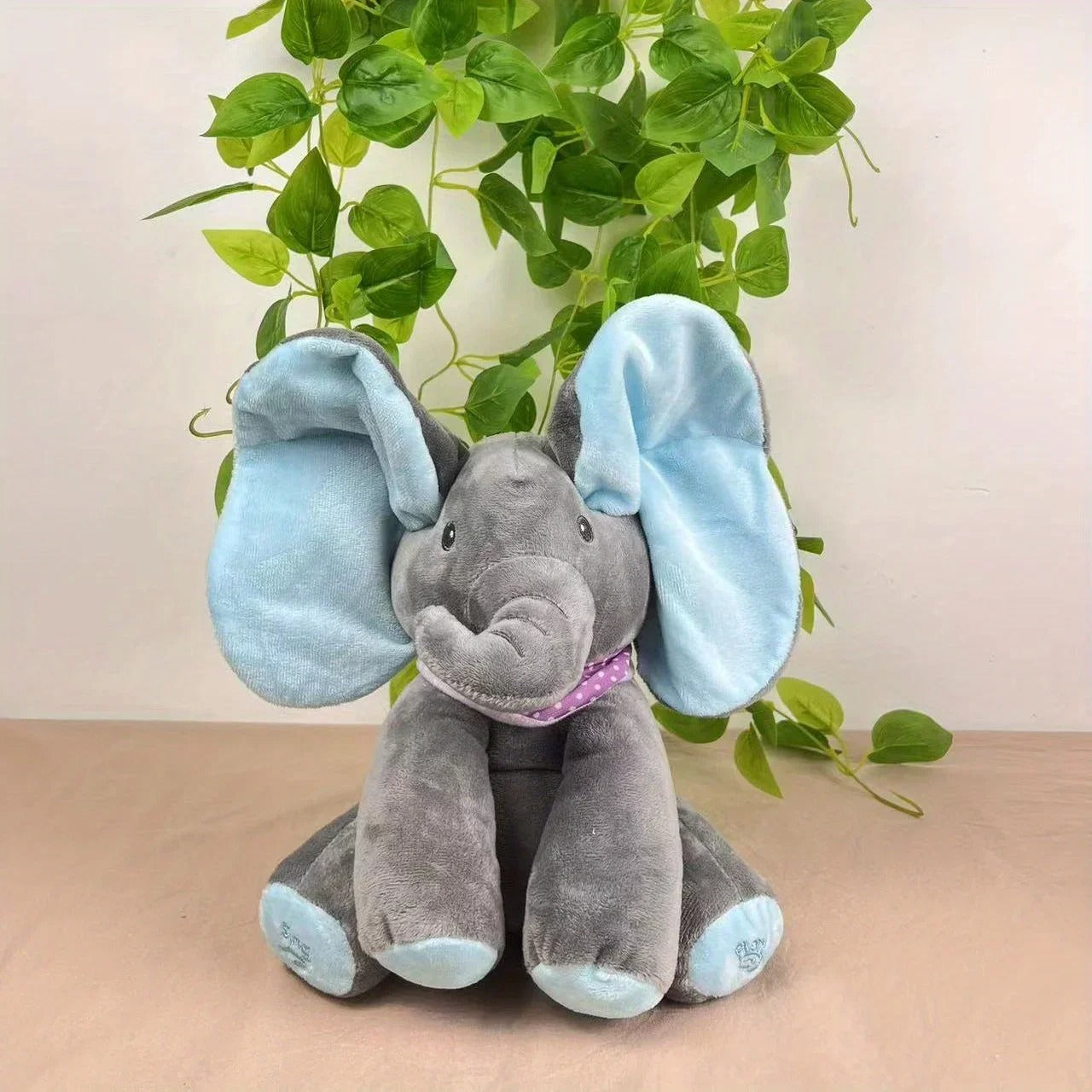 Peluche-interactive-elephant-bleu