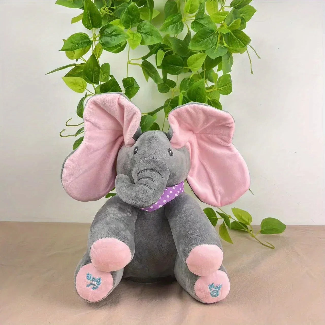 Peluche-interactive-elephant-rose